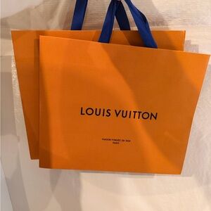 Set of 2 authentic Louis Vuitton shopping bags